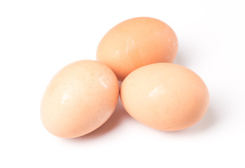 Three eggs isolated on white background