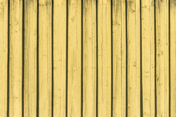 Textured yellow wooden wall