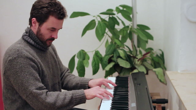 Man makes mistakes while playing the piano