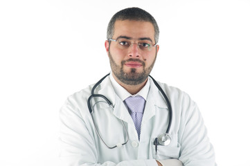 Fototapeta premium Close-up of a doctor holding a stethoscope with his arms crossed