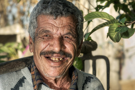 Lebanese Farmer Smiling In The Fields