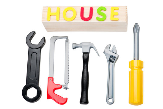 Toy tools and house sign