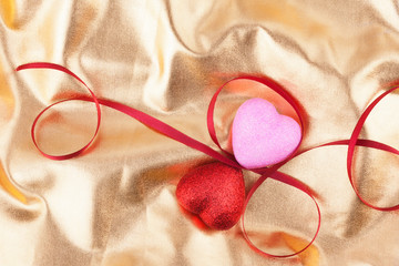 Red and pink heart and satin ribbons