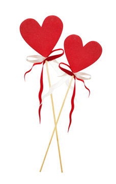 Two red heart on stick with ribbon, isolated