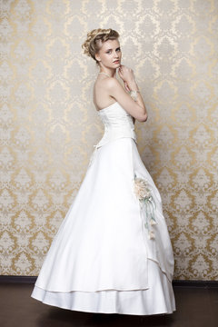 Beautiful girl in the image of the bride