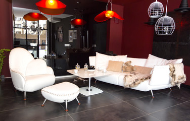 large comfortable living room with lots of lights