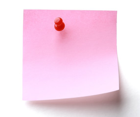 Pink paper note on white background isolated.