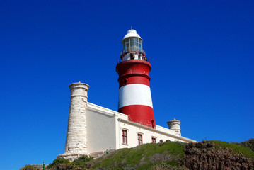 Fototapeta na wymiar Lighthouse of Cape Agulhas (South Africa): The southernmost poin