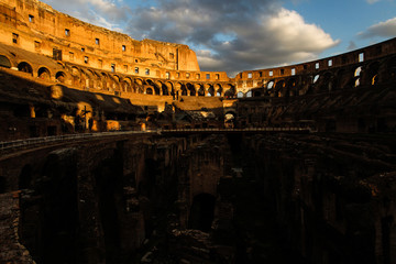 Rome's colosseum inside with rich colours at sunset