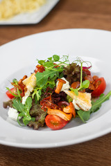 Image of tasty salad in dish in restaurant