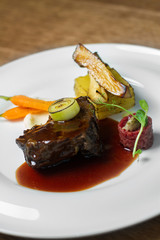 Image of tasty beef in sauce with vegetables