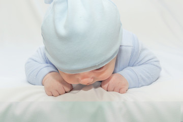 the little boy in a blue a cap