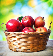 Fresh apples in basket