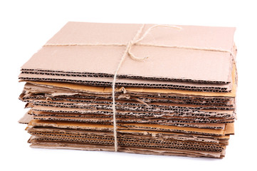 Stack of cardboard for recycling isolated on white