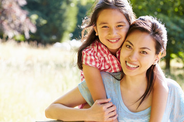 Portrait Of Asian Mother And Daughter In Countryside