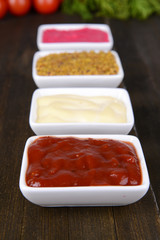Various sauces on table close-up