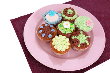 Tasty cupcakes with butter cream,