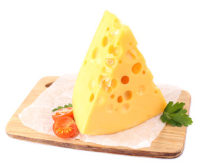 Piece of cheese and tomatoes, on wooden board, isolated on