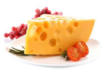 Piece of cheese with grape, tomato and rosemary