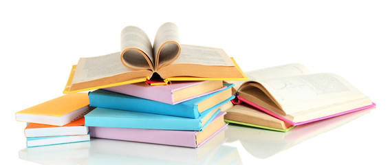 Open and closed books isolated on white