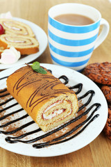 Cup of tea and sweets close up