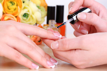Obraz na płótnie Canvas Manicure process in beauty salon close up