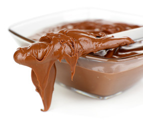 Chocolate cream in bowl isolated on white