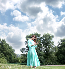 Young woman in green dress