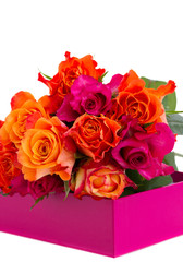 pile  of fresh orange and pink  roses