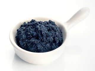 bowl of black caviar on white background