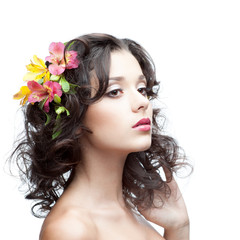 Naklejka premium young woman with flower in hair