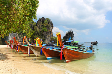 Long tail boat on tropical beach, Krabi, Thailand