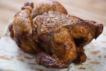 Close-up of a smoked spicy chicken on pita bread