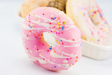Group of glazed donuts, isolated on white background