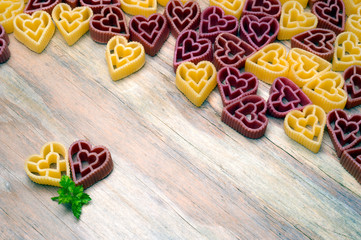 love heart pasta on wooden board