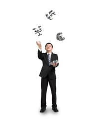 Businessman throwing and catching sliver money symbols