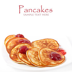 Delicious pancakes with strawberry jam
