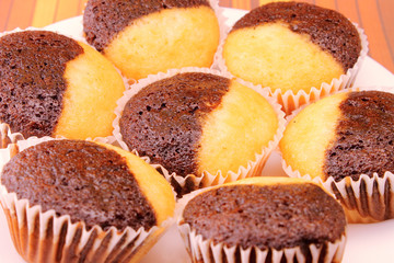 Chocolate and vanilla muffins closeup