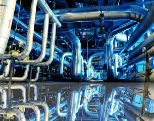 Industrial zone, Steel pipelines in blue tones with reflection
