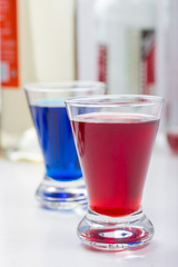 plain blue and red shot drinks