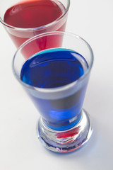 plain blue and red shot drinks