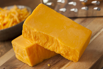 Organic Sharp Cheddar Cheese - obrazy, fototapety, plakaty