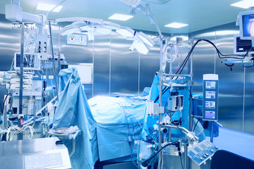 Modern operating room with the patient on the table.