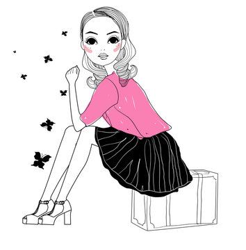 A girl sitting with baggage