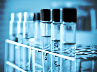 Laboratory glassware with liquid in blue tone