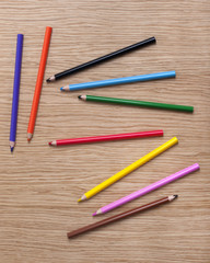 colorful pencils on the wooden table