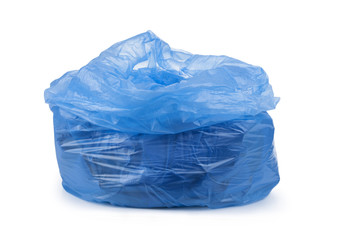 blue garbage bag with trash isolated on white