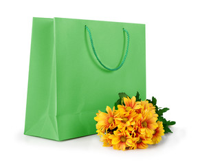 Shopping bag with a bouquet flowers