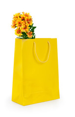 Shopping bag with a bouquet flowers