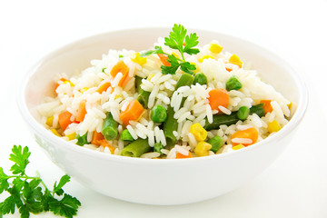 A plate of rice with vegetables. Selective focus.